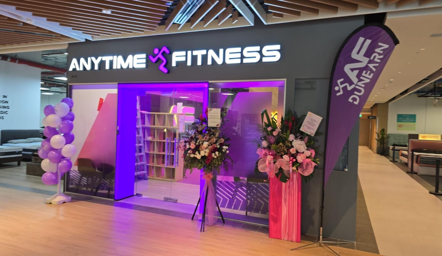 Anytime Fitness gym storefront fit-out by Trident Fitout, entrance decorated with flowers and balloons for its opening at the Dunearn outlet