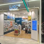 LAC Nutrition for Life retail store fit-out by Trident Fitout, shopfront with supplement shelving and a promotional display screen